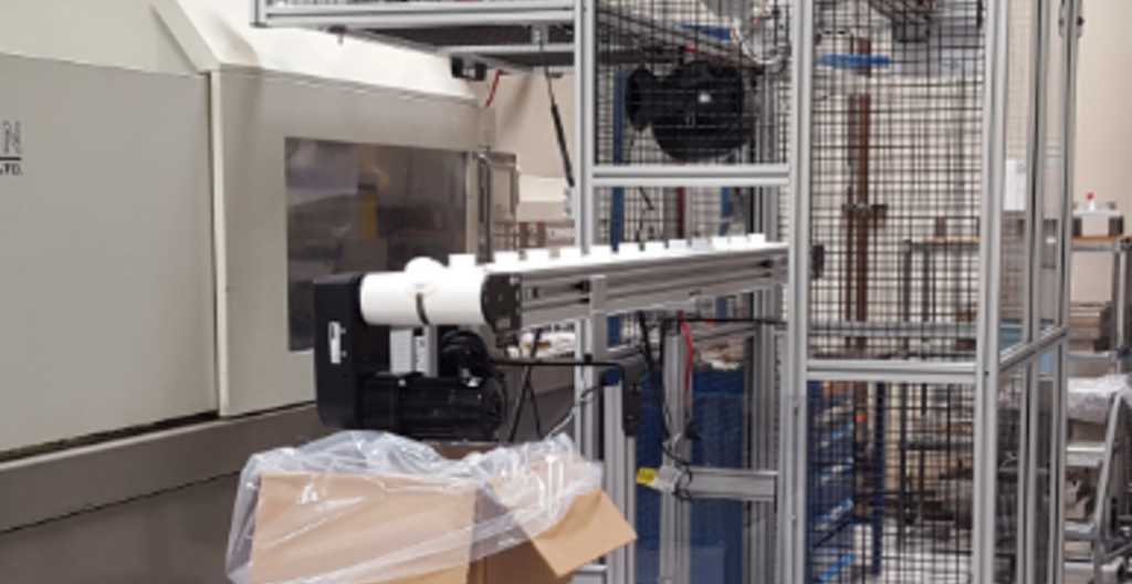 A collaborative robot (Cobot) in use in an industrial facility.