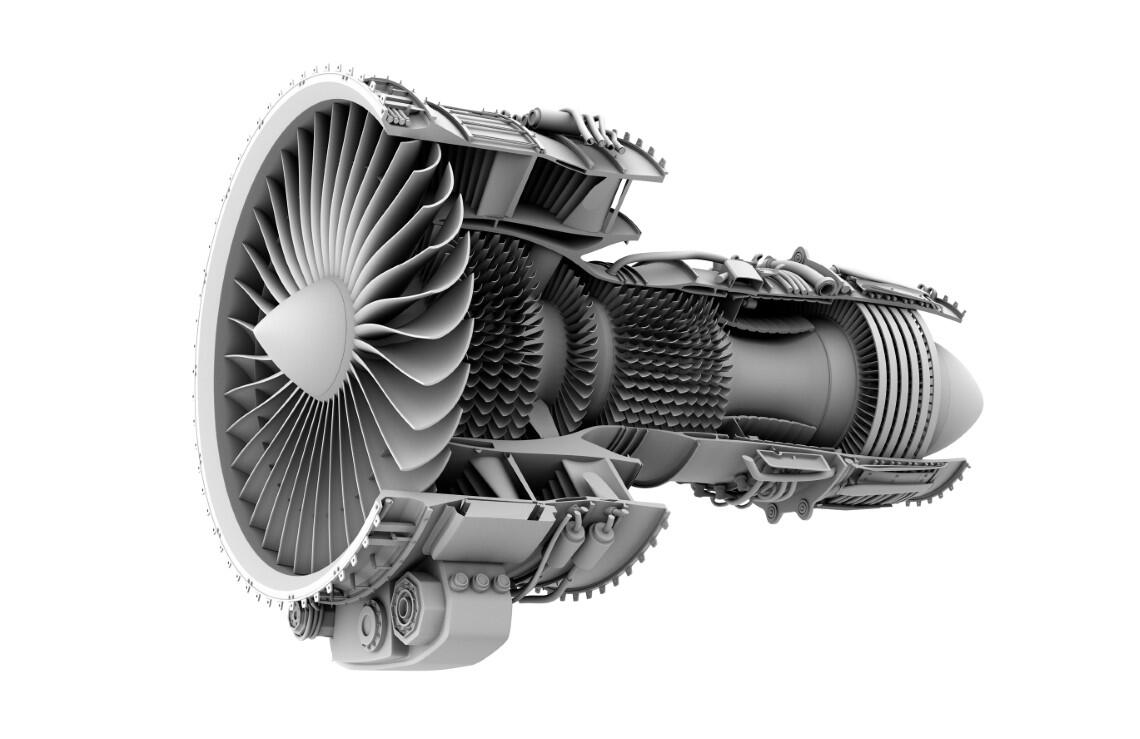 A close-up view of the internals of a jet engine on a white background, highlighting its intricate components and engineering details.