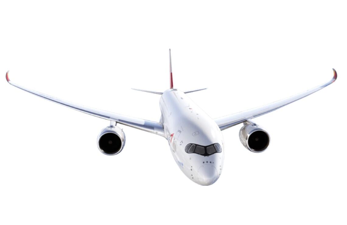 A large passenger jet in flight, gliding through the air isolated on a white backdrop