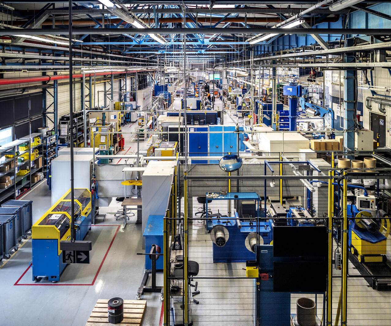 The manufacturing site of Kolo, POland from overhead showing various CNC milling machines, 5S items and walkways