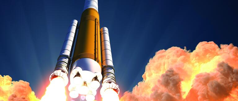 A rocket taking off from a launch pad