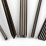 A cross section of five different metal seals.